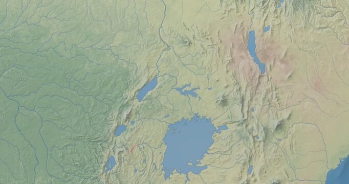 Uganda on Globe. Zoom into the country with Earth spinning on dark background. Physical world map with Uganda and label on it. Country view animation.