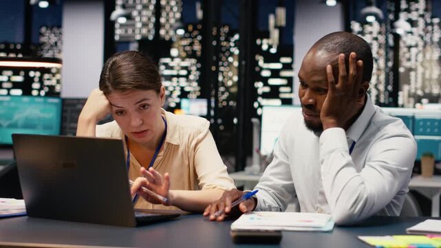 Diverse workers team being exhausted and disappointed with missing deadline, stressed and worried people struggling to finish tasks with low energy and no motivation. Poor results.