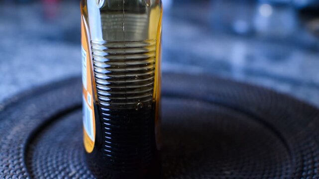 Syrup dripping down the inside of the bottle after usage. 