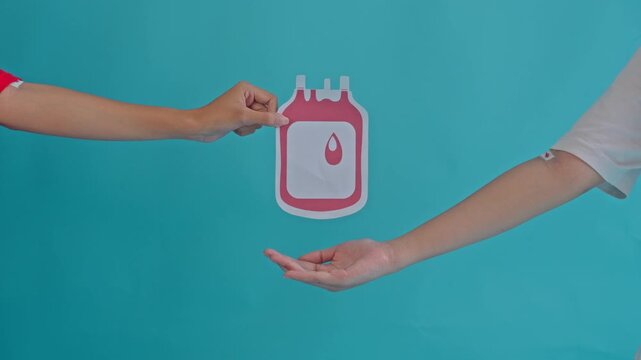 Close-up Slow Motion Blood Donation Process in Medical Clinic with Calm Atmosphere