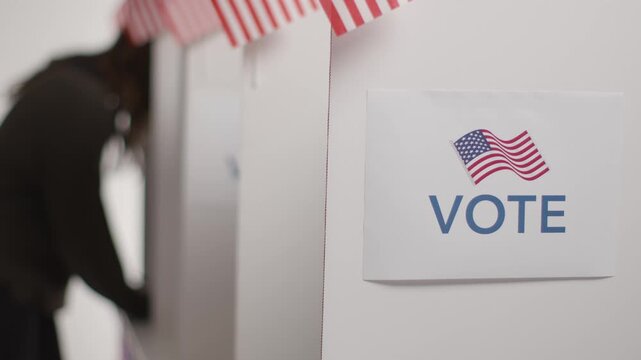 Man with American flag and ballot box illustration showing voting and national symbol concept