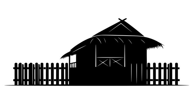 Silhouette of a traditional thatched roof hut with a wooden fence