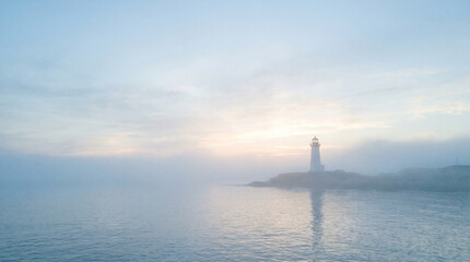 Fototapeta premium Minimalist Lighthouse Scene with Cinematic Coastal Fog Atmosphere