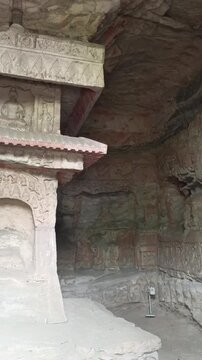 Ancient Buddhist Stone Carvings in Yungang Grottoes, Datong, China.	
