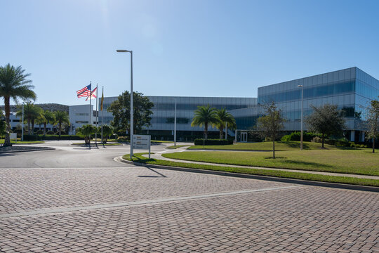 Estero, Florida, USA - December 31, 2021: Hertz global headquarters on Williams Road, Estero, Florida, USA. Hertz Global Holdings, Inc. (formerly The Hertz Corporation), known as Hertz, is an American