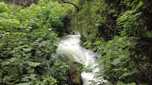 Lush Green Waterfall and Cave in Duden Waterfall Park, Antalya Turkey