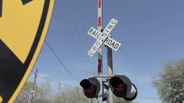 Railroad crossing reveal from behind sign 4k
