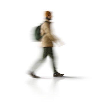 Motion blur walking man silhouette with a backpack isolated on transparent background for mockup scene