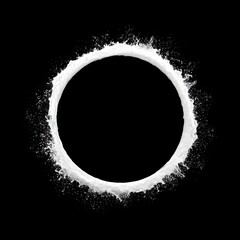 Fototapeta premium A dynamic splash of water forming a perfect circle against a black background.