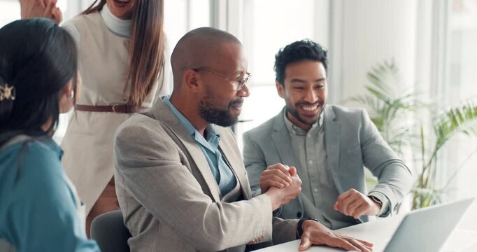 Business people, winner and handshake with laptop for promotion, announcement or negotiation success at office. Group of employees, clapping and celebration for partnership, prize or contract goal