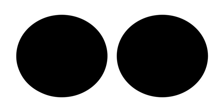 Two solid black circles placed side-by-side on a white background.