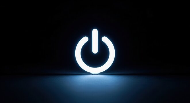 Glowing Power Button Symbol on Dark Background.