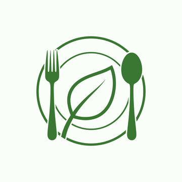 Healthy eating logo featuring spoon fork and leaf on circular plate background for vegan lifestyle organic food dining menu or natural nutrition wellness program branding identity project.