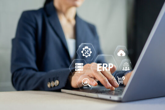 Businesswoman using laptop with ERP Enterprise Resource Planning software integration icon concept