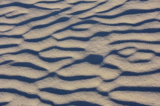 wind-blown, ripple patterns in the gypsum sand dunes of white sands national park near alamogordo in southern new mexico   