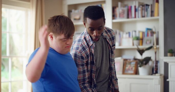 Books, friends and men with study break in home for bonding, choice and social hangout on weekend. Relax, people and person with down syndrome avoiding responsibility for chill or support together