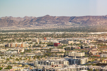 Fototapeta premium In the distance are MacDonald Highlands (Henderson) and Black Mountain (McCullough Range).Las Vegas Valley, Clark County, Nevada.Basin and Range Province, Mojave Desert. from Encore Las Vegas 