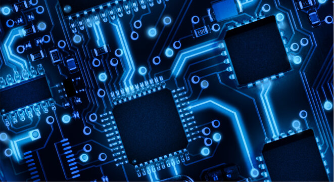 Glowing blue circuit board with microchips and electronic components close up