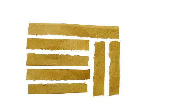 Golden wooden breadsticks on rustic table