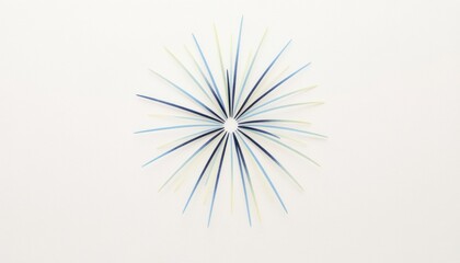 Fototapeta premium Blue and yellow firework burst element on white background with copy space for new year designs, celebration greeting cards and minimal festive holiday templates