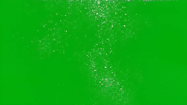 Underwater air bubbles rising to the surface on a green screen background for effect