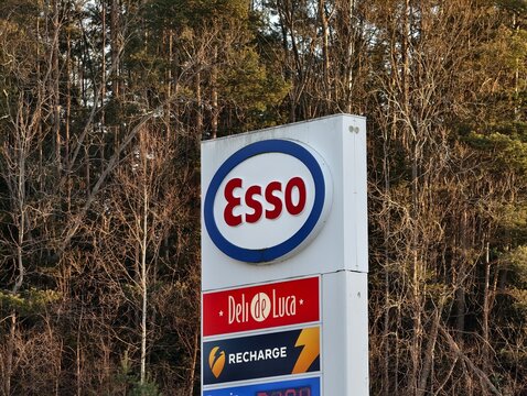 &Oslash;stfold, Norway-Nov.25th 2025: gas station pylon sign featuring Esso brand logo