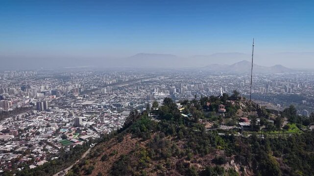 4K aerial drone footage of cerro San Cristobal peak in Santiago de Chile