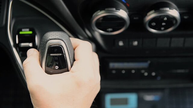 Driver shifting automatic car gear lever