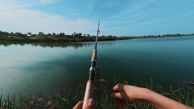 Fishing at local lake in warm weather