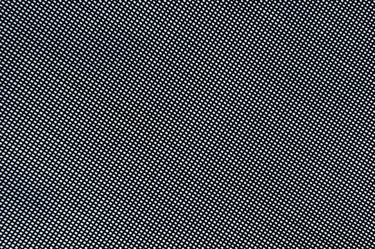 A close up texture of a fine black grid mesh screen showing tiny repeating white geometric square patterns.