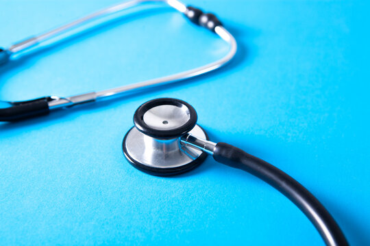 Stethoscope on blue background. Medical stethoscope