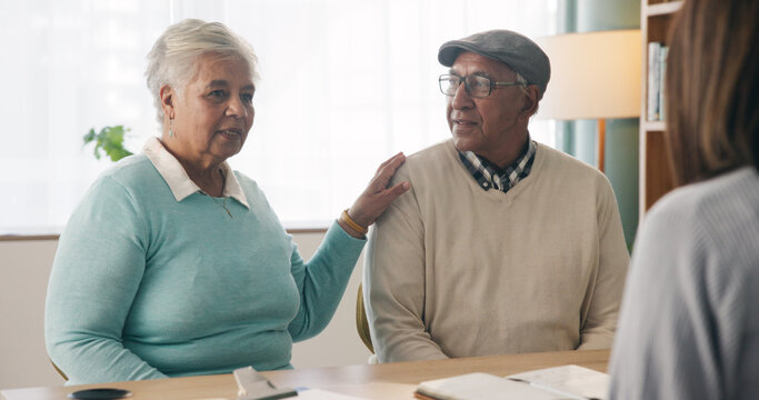 Office, discussion or old couple with consultant for appointment, will planning or beneficiary update. Support, insurance agent or senior people with power of attorney contract, policy help or advice