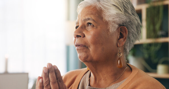Faith, prayer and old woman in house for worship, express gratitude and blessings with hope. Elderly person, hands together and praying in retirement with religion, spiritual guidance and belief