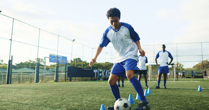 Pitch, soccer and man with cone for training, game practice and running drills for sports. Football player, person and equipment on field for agile exercise, fitness challenge and ball control
