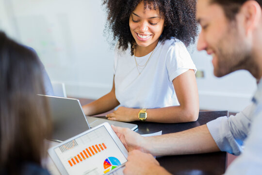 Business people analyzing data in office
