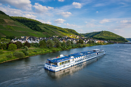 Germany, Rhineland-Palatinate, excursion ship passing Neef village in the Moselle valley