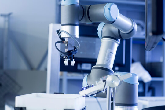 Robot arm in a sensor technology plant