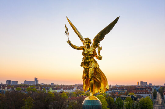 Germany, Bavaria, Munich, Drone view of Angel of Peace monument at sunrise