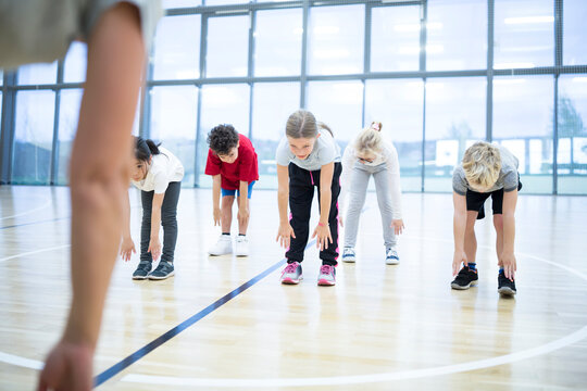 Students participating in physical activity during a school gym class