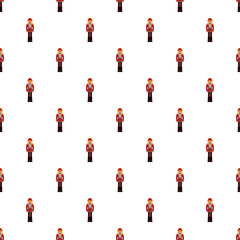 Obraz premium Nutcracker soldier toys forming a repeating pattern, representing holiday traditions and festive decorations