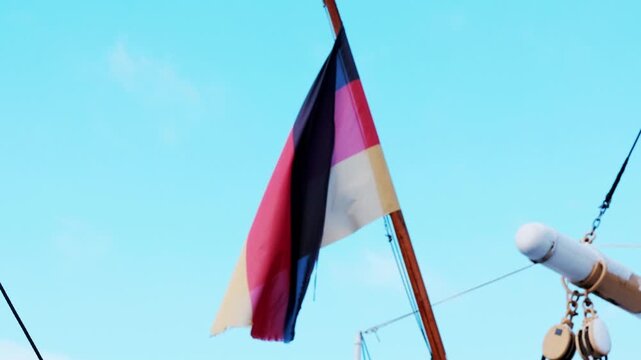 German flag on the back of a ship