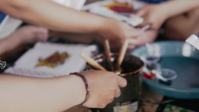 making a batik with hand drawn traditional process with canting