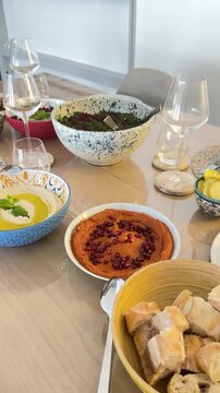 Traditional Lebanese mezze with hummus, muhammara and tabbouleh served at home