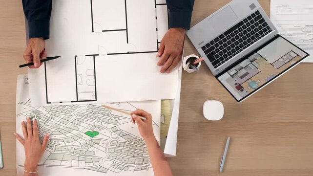 Urban Planner Examines Detailed City Map Carefully