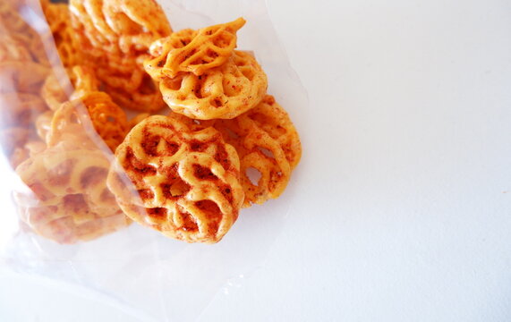 A rose cracker snack flavored with dry seblak seasoning. A spicy snack from West Java, Indonesia.