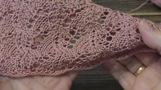Knitting patterns with a raised pattern and yarn in different colors. Knitted texture. Space for text.
