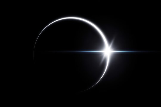 A stunning view of a celestial event with a crescent shape and bright starburst effect.