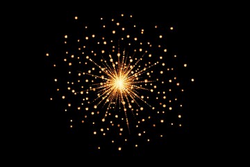 Obraz premium Sparkling golden starburst pattern against a black background.