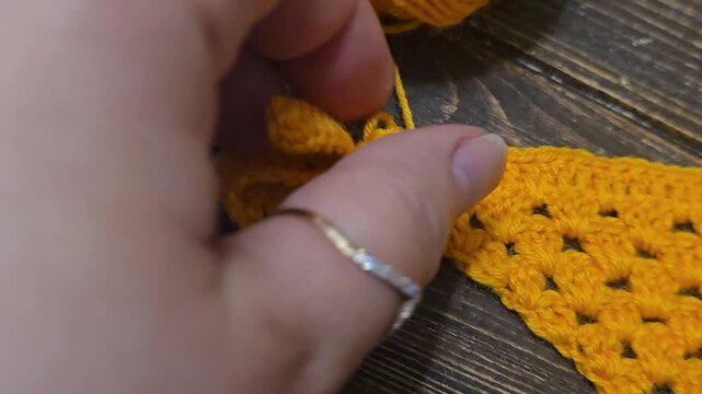Knitting patterns with a raised pattern and yarn in different colors. Knitted texture. Space for text.