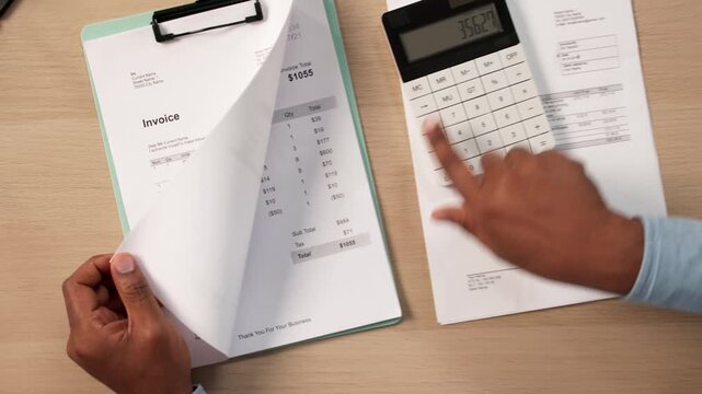 Accountants Carefully Reviewing Invoice And Budget Details